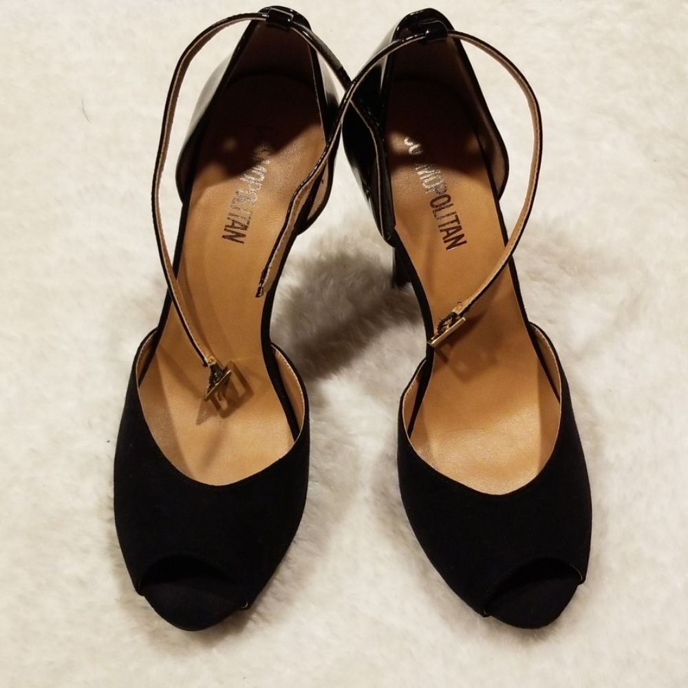 Open toe black heels.
